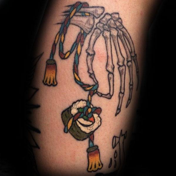 Cool Skeleton Hand Holding Sushi Tattoo Design Ideas For Male On Leg Calf