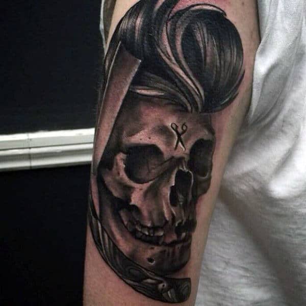 Cool Skull With Head Of Hair Tattoo On Mans Arm