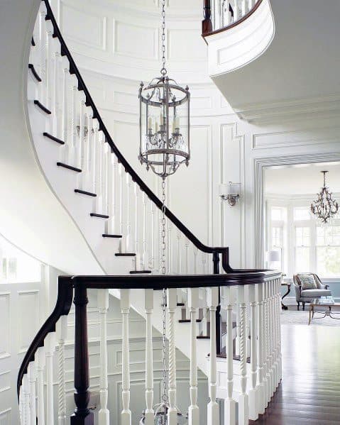ornate grand staircase in elegant home
