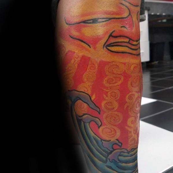 Colorful Sublime-inspired tattoo featuring a stylized sun face with bold red rays, swirling patterns, and ocean waves below.
