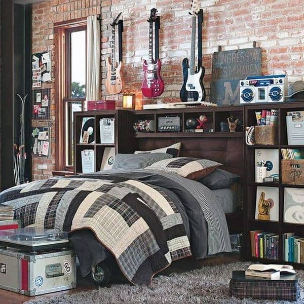Bedroom with a quilt-covered bed, wall guitars, shelves, books, and vintage decor items
