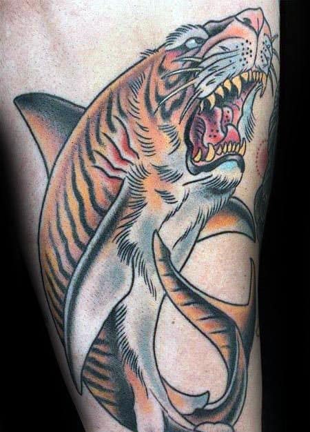 Striking tiger shark tattoo with a fierce tiger head, blending predator traits in a bold, hybrid design full of energy and power.