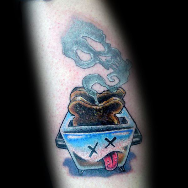 Colorful toaster tattoo with burnt toast, cartoon-style X eyes, and a skull-shaped smoke cloud, blending humor and dark aesthetics.