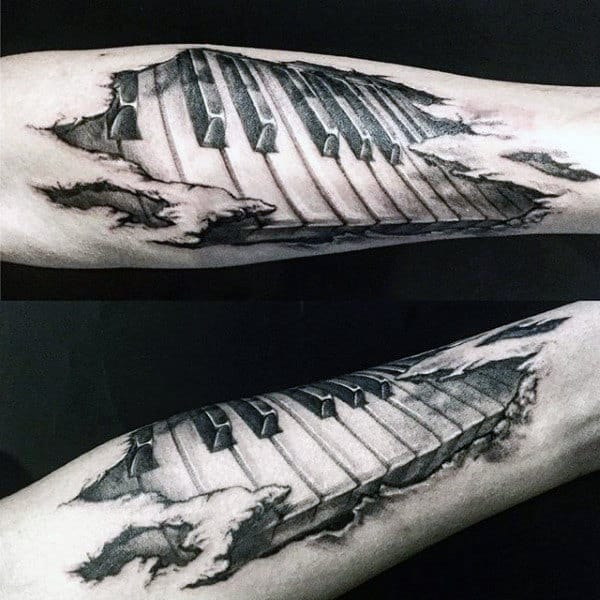 Cool Torn Skin Male Forearm Tattoo Of Piano Keys