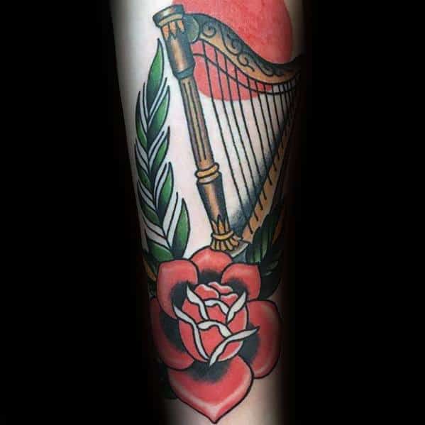 Cool Traditional Rose Flower Harp Tattoo Design Ideas For Male Forearm