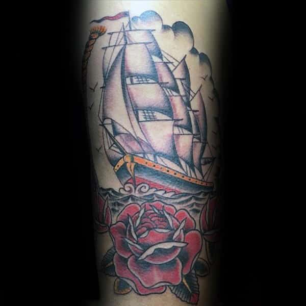 Cool Traditional Rose With Sailing Ship Male Forearm Tattoo Design Ideas