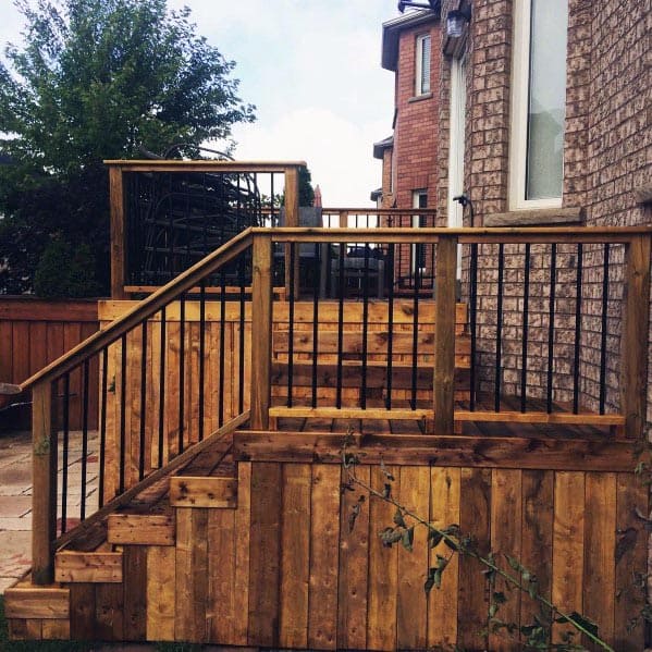 traditional wood deck skirting wood railing with metal baluster