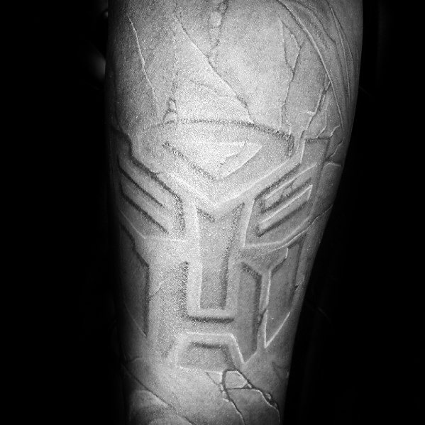 Cool Transformers Logo Mens Stone Forearm Tattoo Design
