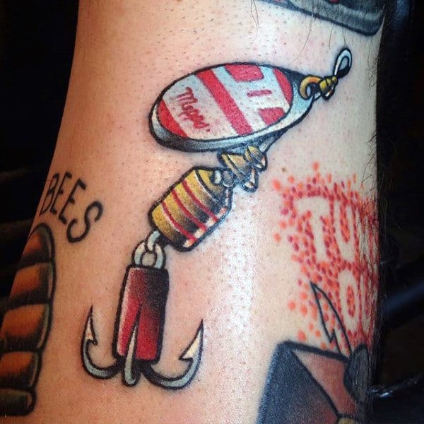 Cool Treble Fish Hook Tattoo On Mans Arm