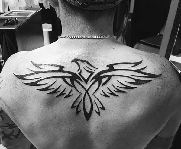 Cool Tribal Bird Upper Back Tattoo Design Ideas For Gentlemen
