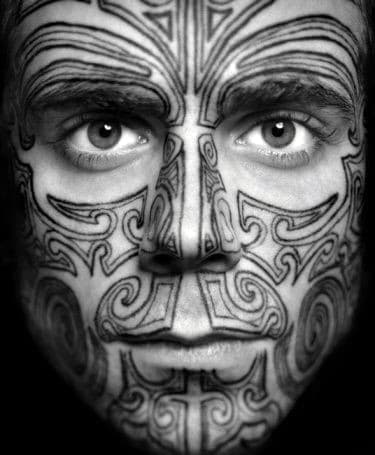 Cool Tribal Patterned Male Face Tattoo Design Ideas