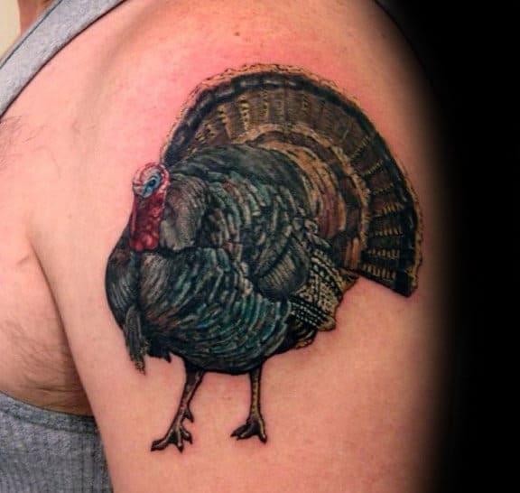 Cool Upper Arm Tattoo Of Turkey On Man