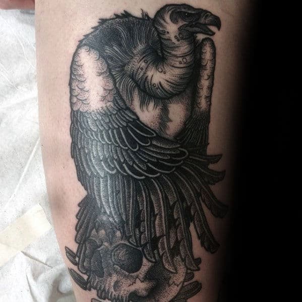 Cool Vulture Standing On Skull Arm Tattoo For Men