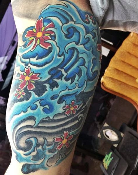 Cool Water Wave Tattoos For Guys On Bicep