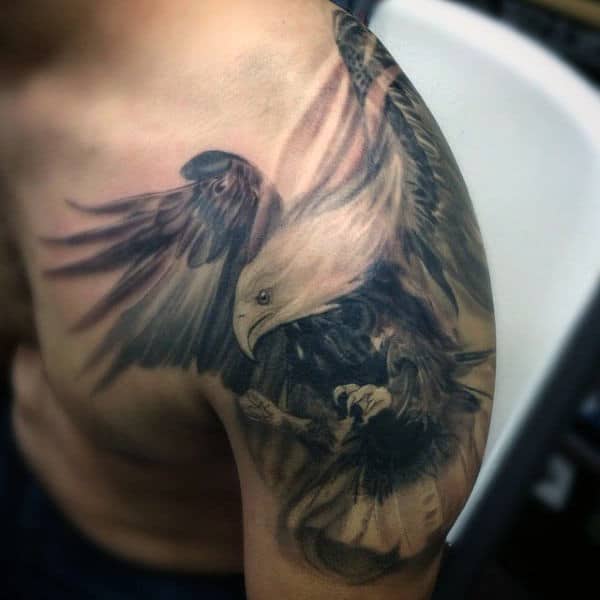 Cool Windswept Hawk Tattoo On Gentleman Shoulder