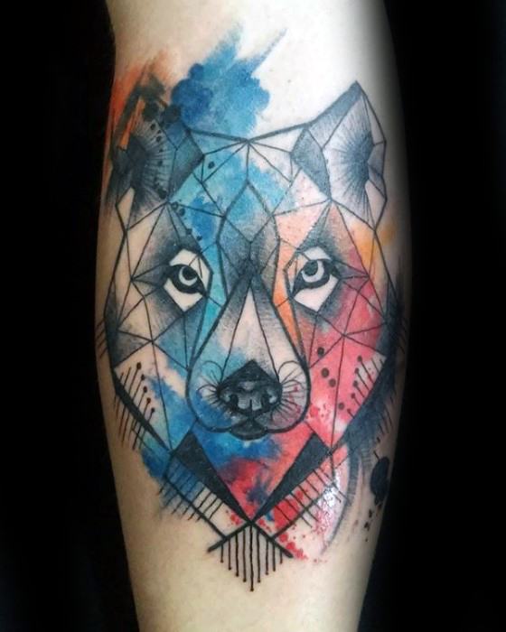 Geometric wolf tattoo with bold black linework and watercolor splashes in blue, red, and orange for a modern artistic vibe.