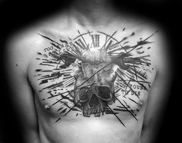 Chest tattoo featuring a skull, crossed wrenches, Roman numerals, and abstract lines with the phrases TOO LATE TO LIVE and TOO YOUNG TO DIE.
