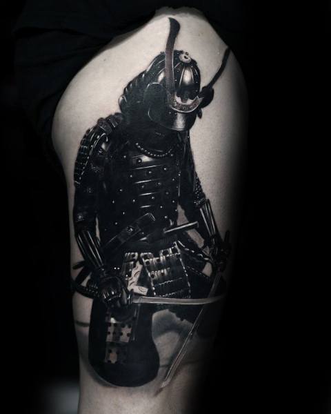 Realistic black and grey tattoo of a kneeling samurai with bowed head and drawn sword, symbolizing honor, humility, and warrior discipline.