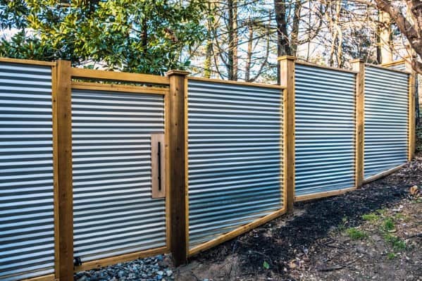 steel and wood privacy fence with gate