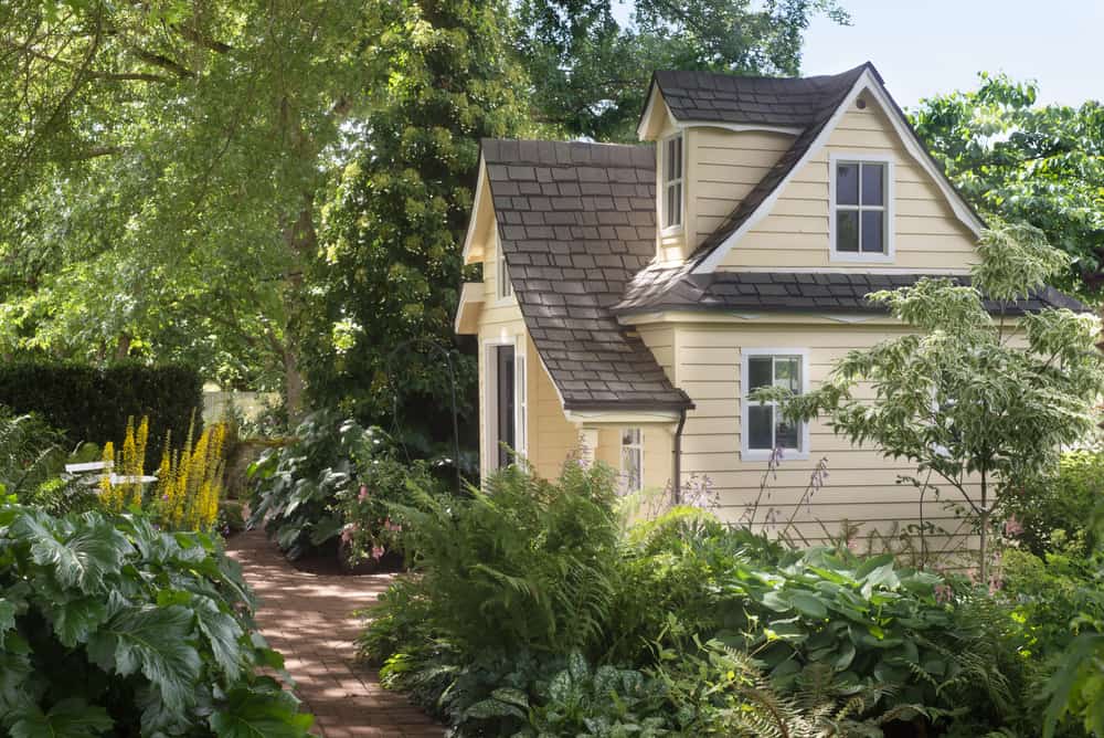 small cottage home with large leafy garden 