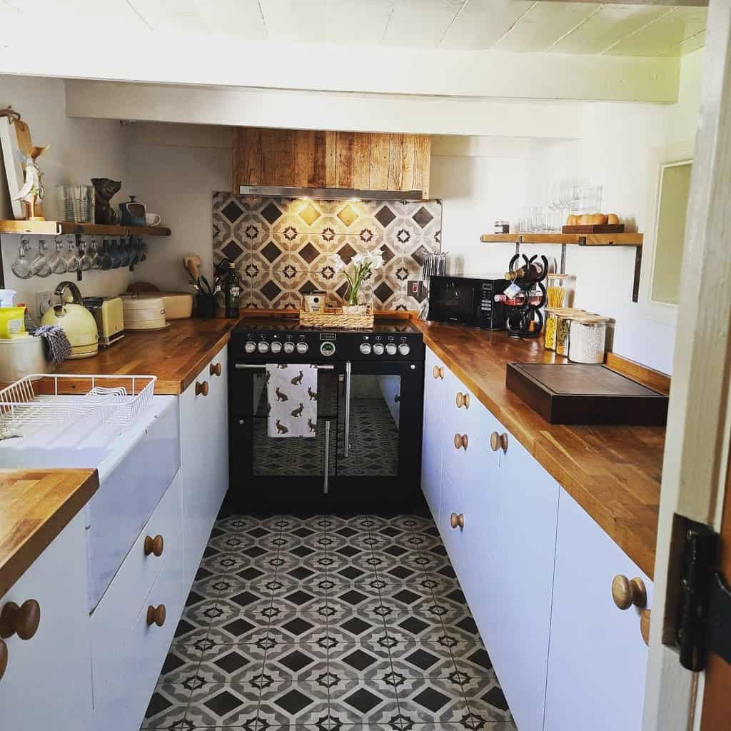 narrow cottage galley kitchen ideas pattern tile splashback white cabinets wood countertops