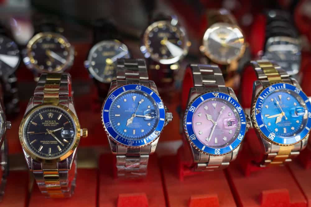 counterfeit rolex watches on sale at a local street market in phnom penh, cambodia