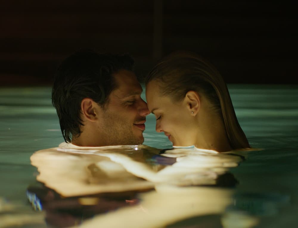 couple late night date swimming