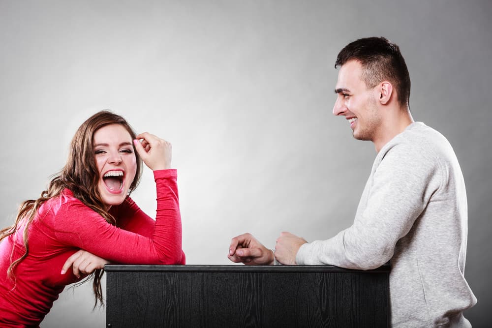 couple talking laughing
