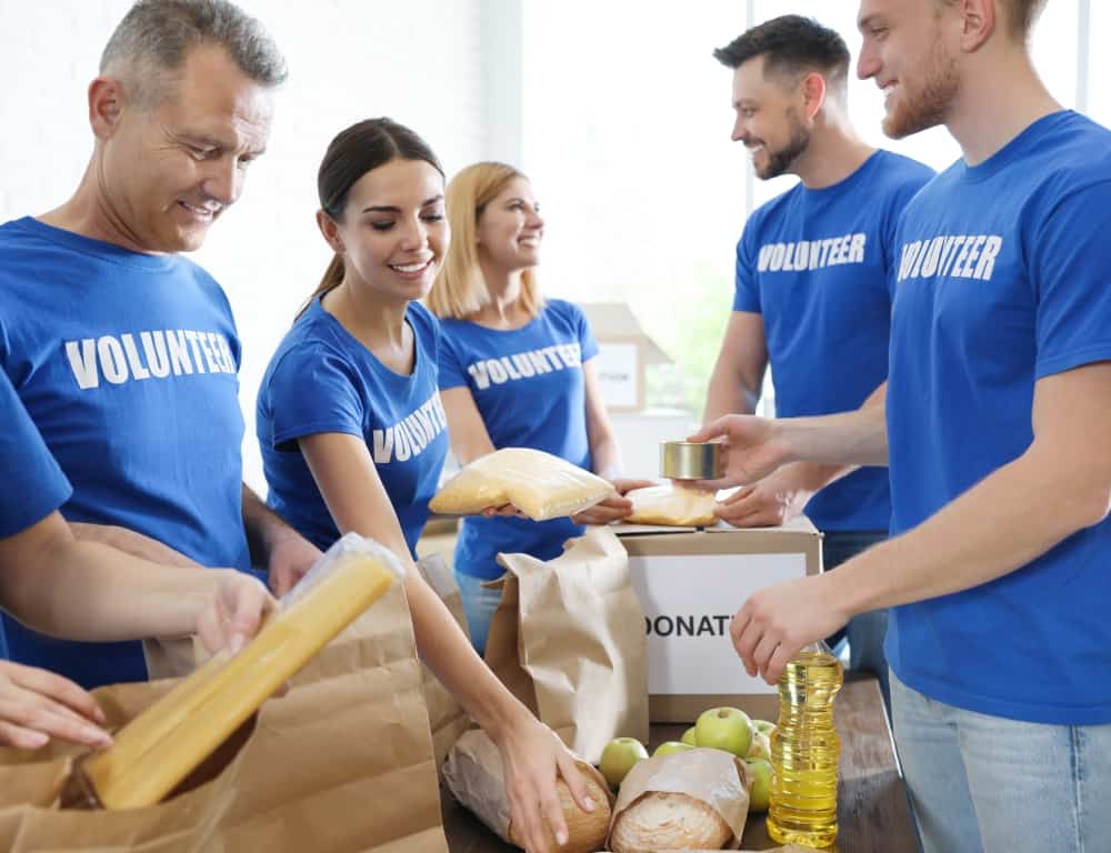 couple volunteering for food donations