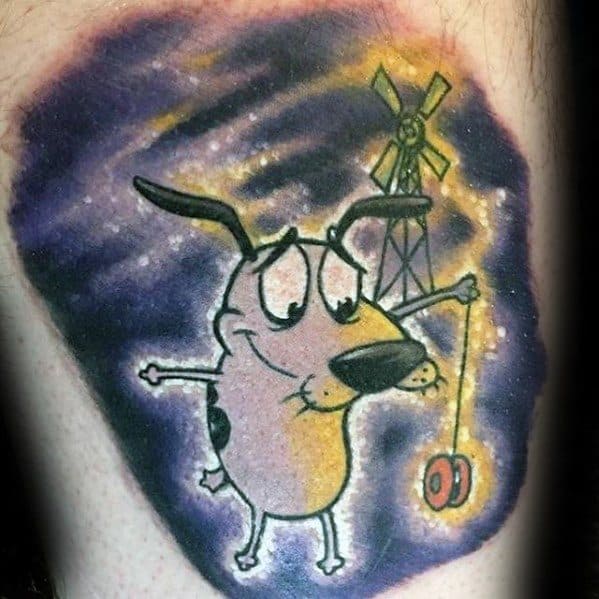 Courage the Cowardly Dog tattoo with a calm expression, holding a yo-yo in front of a windmill and starry purple night sky.
