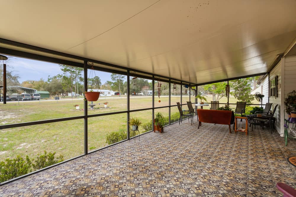 large covered enclosed patio ideas pattern carpet table and chairs 