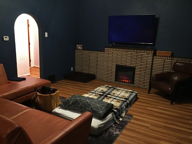 cozy traditional brick fireplace wall mounted tv brown sofa 