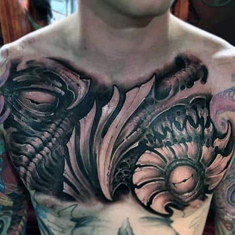 Crazy Ornate Male Upper Chest Tattoos