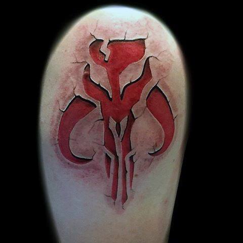 3D red Mythosaur skull tattoo with cracked skin effect, giving the illusion of the symbol being carved into the upper arm.