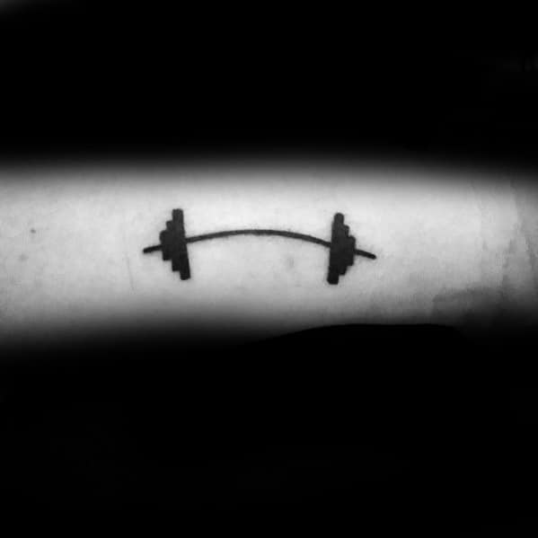 Simple black barbell tattoo with a slight curve, symbolizing strength, persistence, and a minimalist approach to fitness.