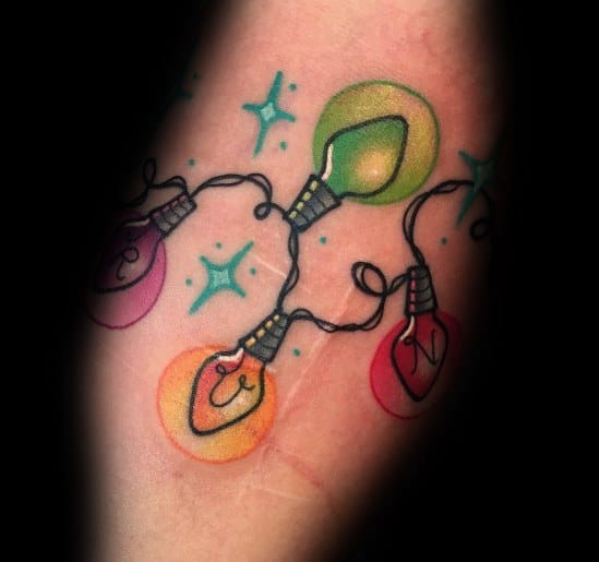 Christmas tattoo of a string of colorful holiday lights with glowing effects and sparkles, creating a festive and cheerful holiday design.