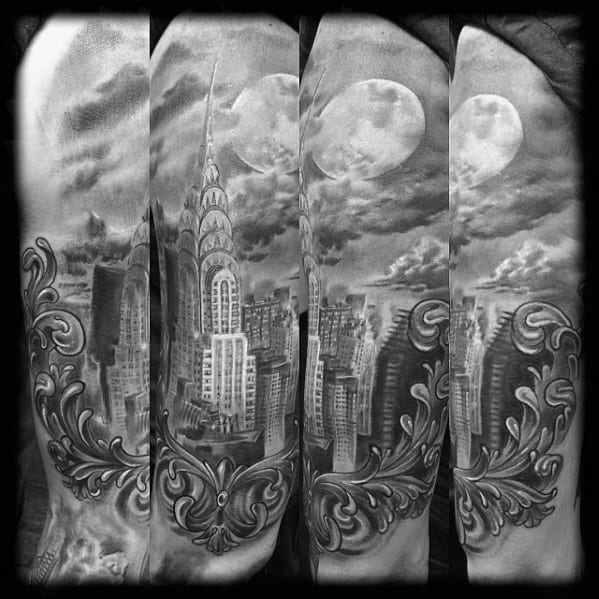 Detailed black-and-grey Chrysler Building tattoo framed by ornate accents under a full moon and moody sky, capturing nighttime drama.