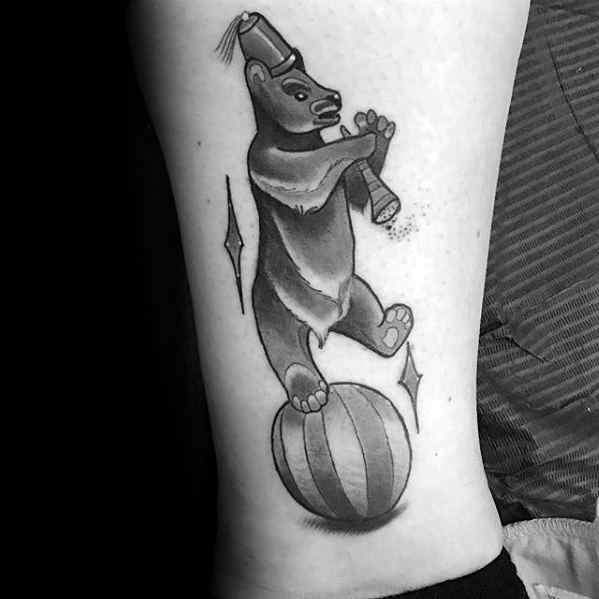 Creative Circus Bear On Ball Tattoos For Men On Lower Leg