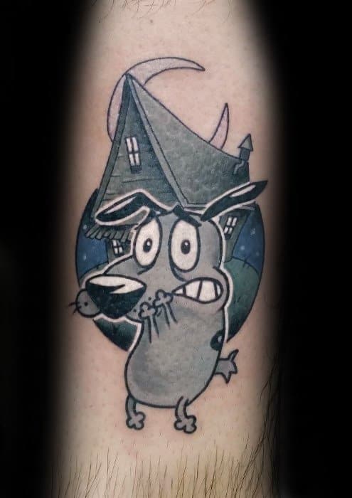 Black and grey tattoo of a nervous Courage the Cowardly Dog with his house and a crescent moon in the eerie night sky behind him.