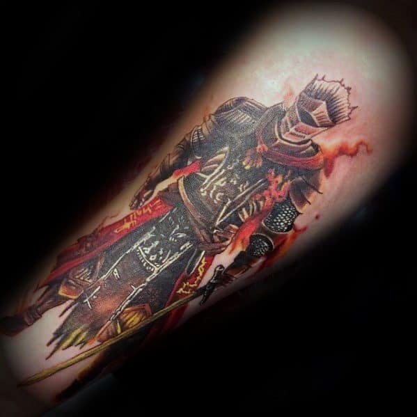 Dark knight tattoo design inspired by Dark Souls, featuring detailed armor, fire effects, and a glowing sword on forearm.