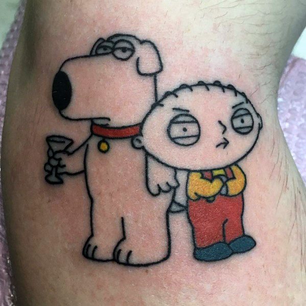 Tattoo of Brian and Stewie Griffin from Family Guy, with Brian holding a martini and Stewie standing with crossed arms, both looking unimpressed.