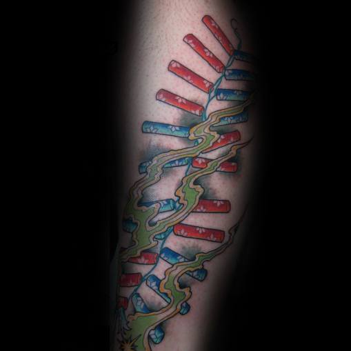 Tattoo of a string of red and blue firecrackers with a lit fuse, wrapped in swirling smoke, creating a bold and dynamic design.