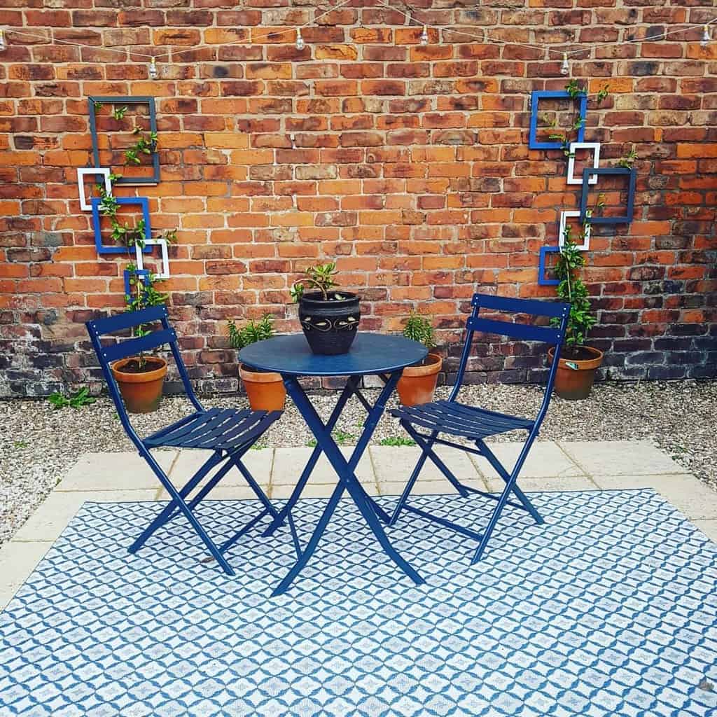 unique wood frame garden trellis blue outdoor setting pot plants