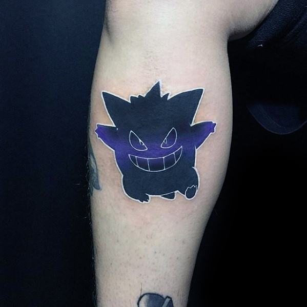 Minimalist Gengar tattoo with a black silhouette and subtle purple gradient, featuring glowing eyes and a mischievous grin.