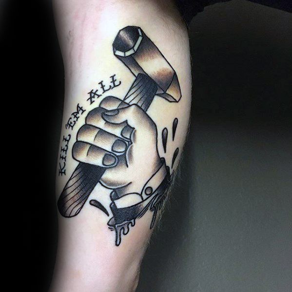 Traditional-style tattoo of a hand gripping a hammer with blood splatter and Kill 'Em All text, referencing Metallica’s debut album.