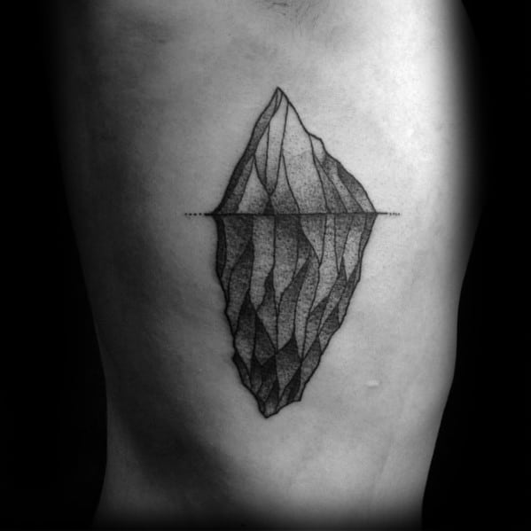Fine line iceberg tattoo with detailed shading, showing the massive submerged portion below a dotted waterline.