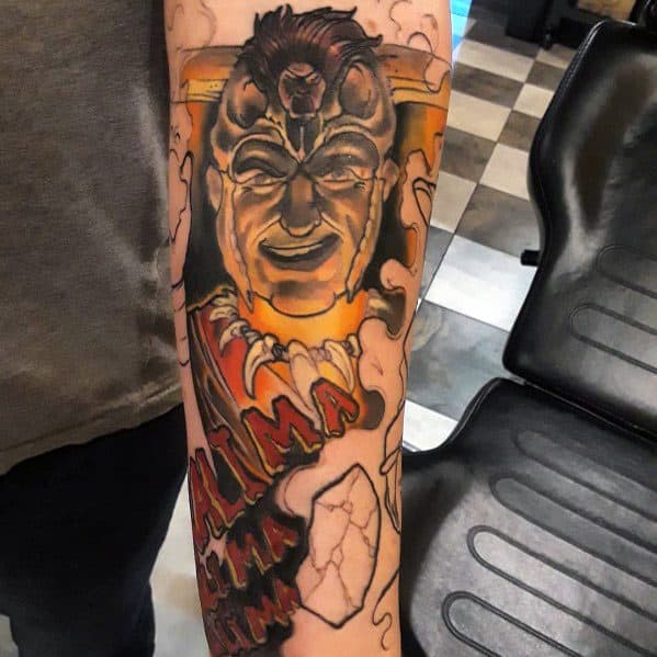 Indiana Jones-themed tattoo of Mola Ram from Temple of Doom, glowing in fiery tones, chanting 'Kali Ma' with a sacred stone below.