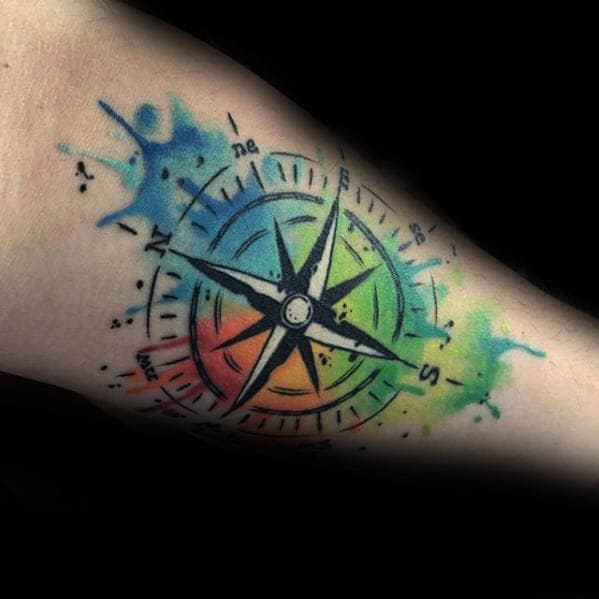Creative Inner Forearm Tattoo Of Watercolor Compass On Man