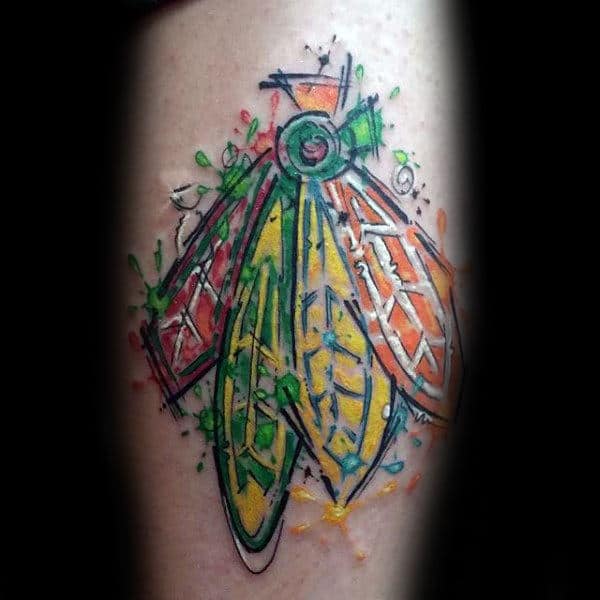 Creative Male Chicago Blackhawks Arm Tattoos