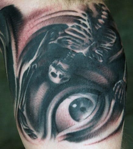 Creative Men's Skeleton Bone Tattoos With Eyeball On Bicep